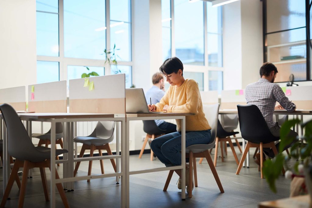 student-girl-working-on-project-in-coworking-space-KJB7NSP.jpg
